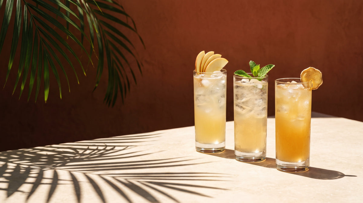 Three garnished Gem Juice serves in the sun